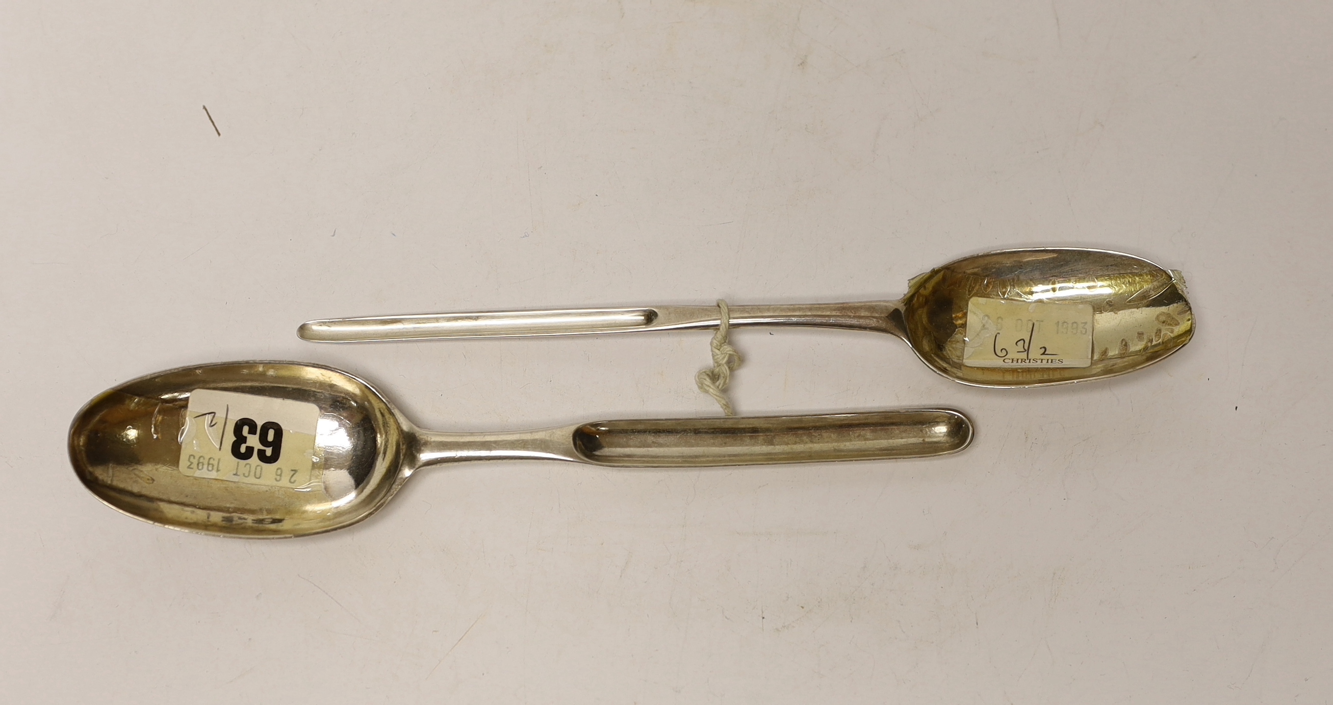 Two mid 18th century Irish silver combination marrow scoop spoons, marks rubbed, longest 22.8cm, 126 grams.